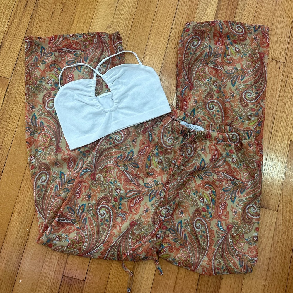 the most STUNNING orange and gold paisley printed pants by badgley mischka !!